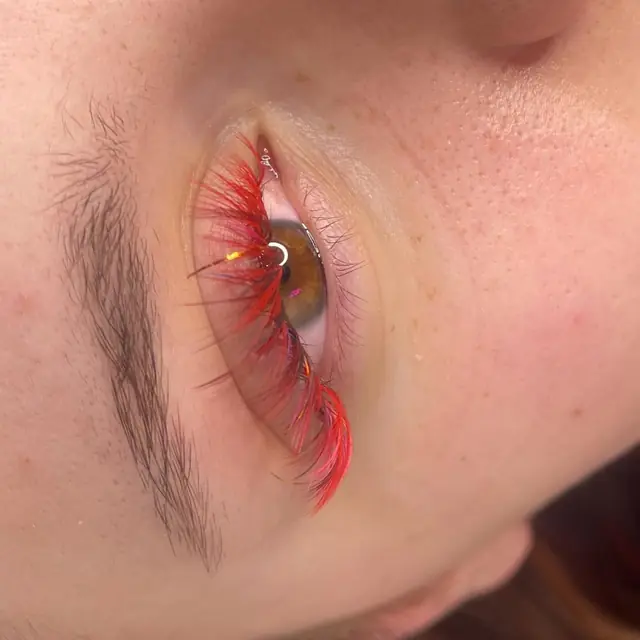 Red and pink color lashes by Whiplash, LLC in Manitowoc, WI